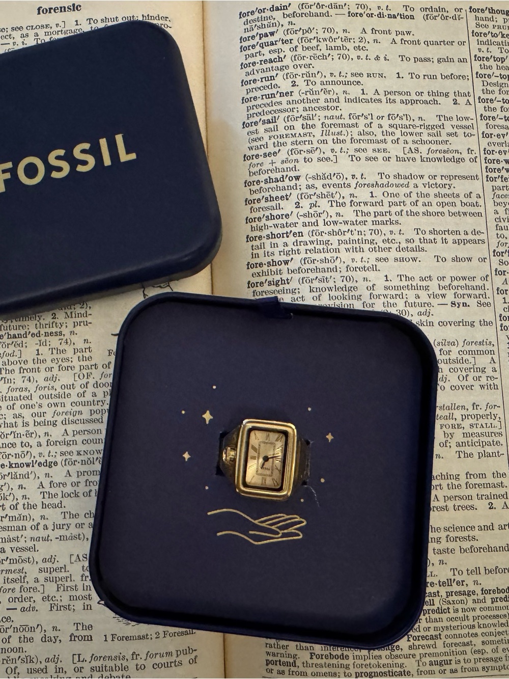 Fossil gold-tone rectangular ring with cream dial detail